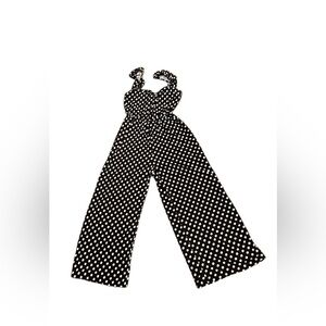 Cute polkadot jumpsuit. Brand new. Never been worn.
